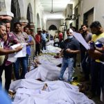 Families line up to bury dead from India bridge collapse
